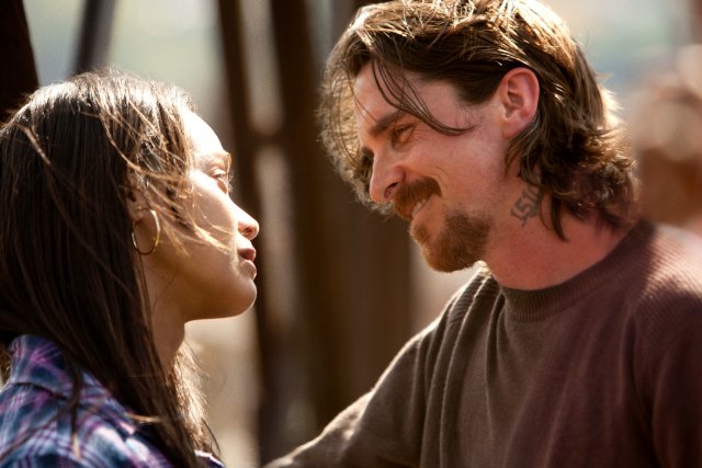 Zoe Saldana stars as Lena Warren and Christian Bale stars as Russell Baze in Relativity Media's Out of the Furnace (2013). Photo credit by Kerry Hayes.