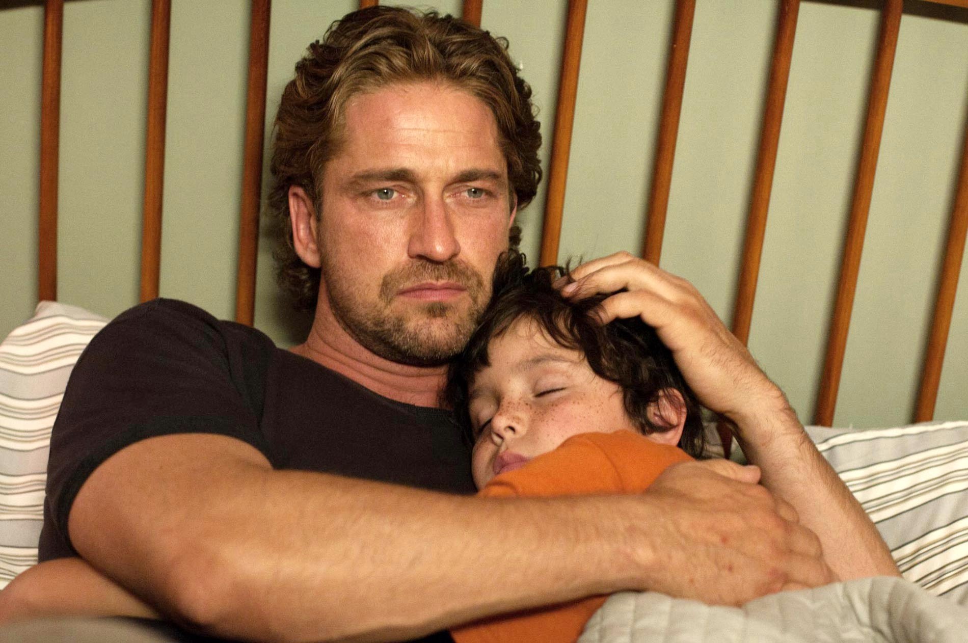Gerard Butler stars as George and Noah Lomax stars as Lewis in FilmDistrict's Playing for Keeps (2012)