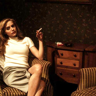 Brittany Murphy stars as June in Image Entertainment's Across the Hall (2010)