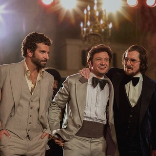 Amy Adams, Bradley Cooper, Jeremy Renner, Christian Bale and Jennifer Lawrence in Columbia Pictures' American Hustle (2013). Photo credit by Francois Duhamel.