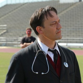 Ted Raimi stars as Dr. Higgs in Epix's Attack of the 50 Foot Cheerleader (2012)