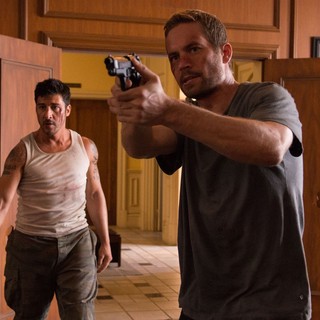 David Belle stars as Lino and Paul Walker stars as Damien in Relativity Media's Brick Mansions (2014)