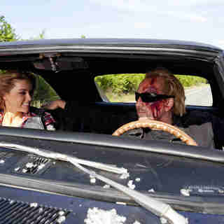 Amber Heard stars as Piper and Nicolas Cage stars as Milton in Summit Entertainment's Drive Angry (2011)