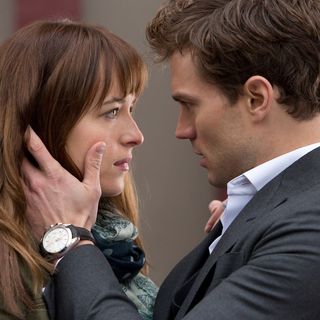 Dakota Johnson stars as Anastasia Steele and Jamie Dornan stars as Christian Grey in Focus Features' Fifty Shades of Grey (2015)