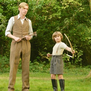 Domhnall Gleeson stars as A.A. Milne and Will Tilston stars as Christopher Robin in Fox Searchlight Pictures' Goodbye Christopher Robin (2017)
