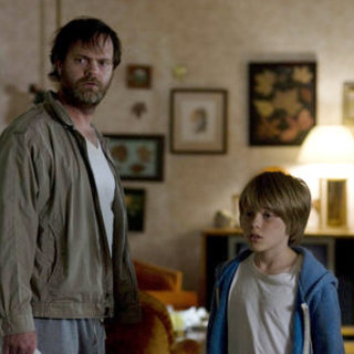 Rain Willson stars as Paul Forney and Devin Brochu stars as T.J. in Newmarket Films' Hesher (2011)