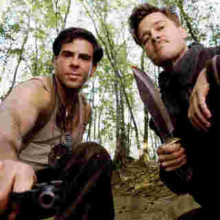 Eli Roth stars as Sgt. Donnie Donowitz and Brad Pitt stars as Lieutenant Aldo Raine in The Weinstein Company's Inglourious Basterds (2009)