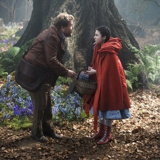 James Corden stars as The Baker and Lilla Crawford stars as Red Riding Hood in Walt Disney Pictures' Into the Woods (2014)