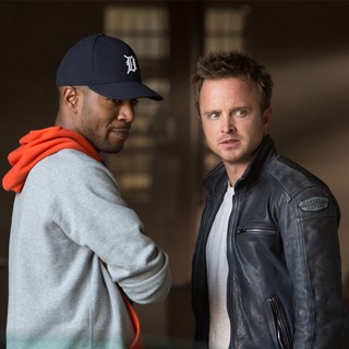 Kid Cudi and Aaron Paul (stars as Tobey Marshall) in Walt Disney Pictures' Need for Speed (2014). Photo credit by Melinda Sue Gordon.