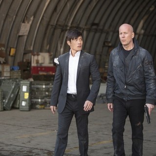 Lee Byung-hun stars as Han Cho Bai and Bruce Willis stars as Frank in Summit Entertainment's Red 2 (2013)