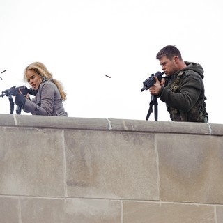Isabel Lucas stars as Erica and Chris Hemsworth stars as Jed Eckert in FilmDistrict's Red Dawn (2012)