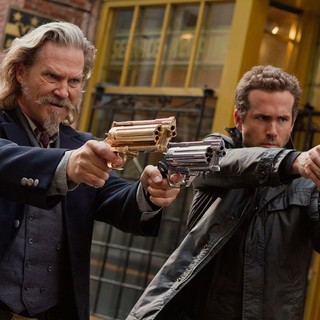 Jeff Bridges stars as Roy Pulsipher and Ryan Reynolds stars as Nick Walker in Universal Pictures' R.I.P.D. (2013)