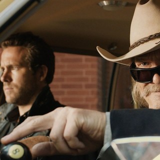 Ryan Reynolds stars as Nick Walker and Jeff Bridges stars as Roy Pulsipher in Universal Pictures' R.I.P.D. (2013)