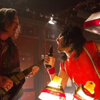 Alec Baldwin stars as Dennis Dupree and Russell Brand stars as Lonnie in Warner Bros. Pictures' Rock of Ages (2012)