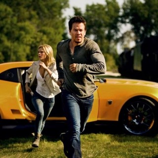 Nicola Peltz stars as Tessa Yeager and Mark Wahlberg stars as Cade Yeager in Paramount Pictures' Transformers: Age of Extinction (2014). Photo credit by Andrew Cooper.