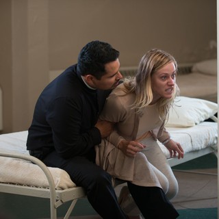 Michael Pena stars as Father Lozano and Olivia Taylor Dudley stars as Angela in Pantelion Films' The Vatican Tapes (2015)