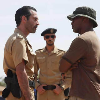 Ashraf Barhom as Col. Al-Ghazi and Jamie Foxx as Ronald Fluery in Universal Pictures' The Kingdom (2007)