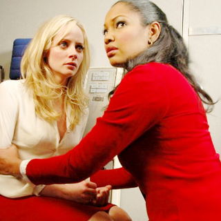 Marley Shelton stars as Cora and Garcelle Beauvais stars as Maggie in Screen Media Films' Women in Trouble (2009)