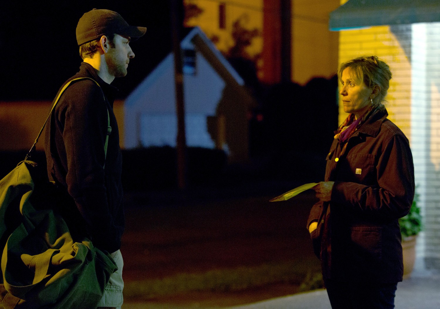 John Krasinski stars as Dustin Noble and Frances McDormand stars as Sue Thomason in Focus Features' Promised Land (2012)