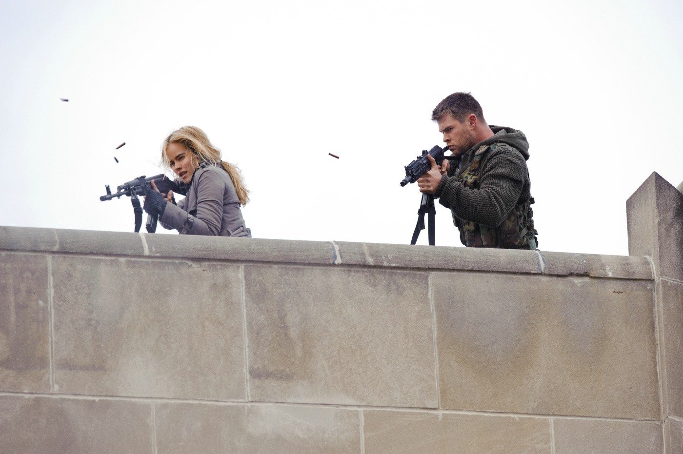 Isabel Lucas stars as Erica and Chris Hemsworth stars as Jed Eckert in FilmDistrict's Red Dawn (2012)