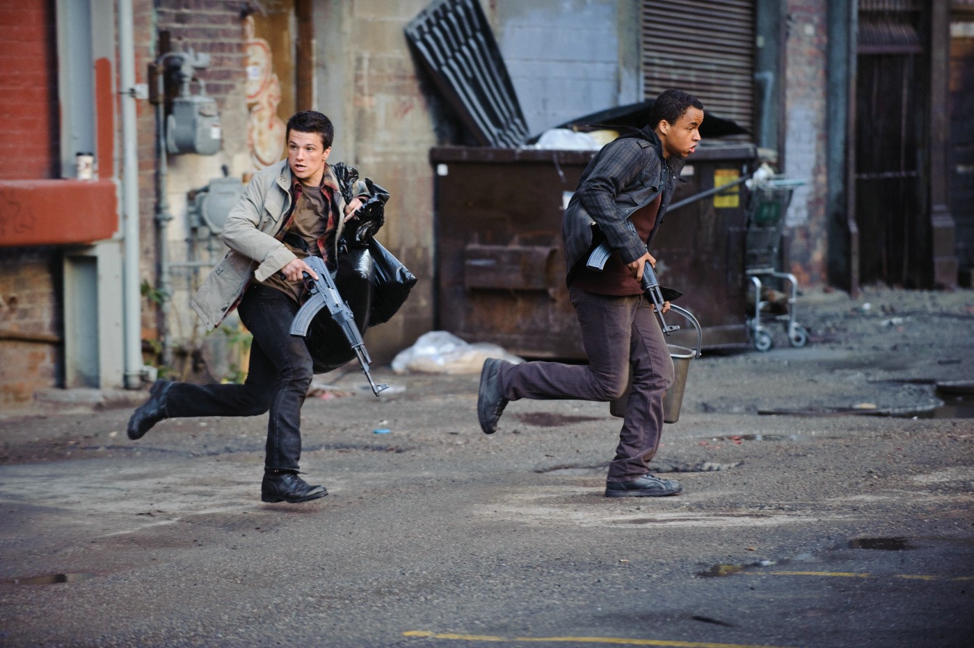 Josh Hutcherson stars as Robert and Connor Cruise stars as Daryl Jenkins in FilmDistrict's Red Dawn (2012)