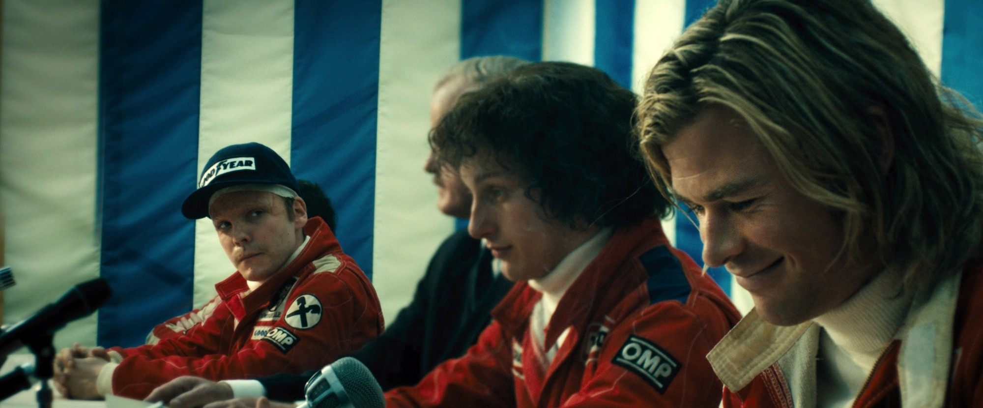 Daniel Bruhl stars as Niki Lauda and Chris Hemsworth stars as James Hunt in Universal Pictures' Rush (2013)