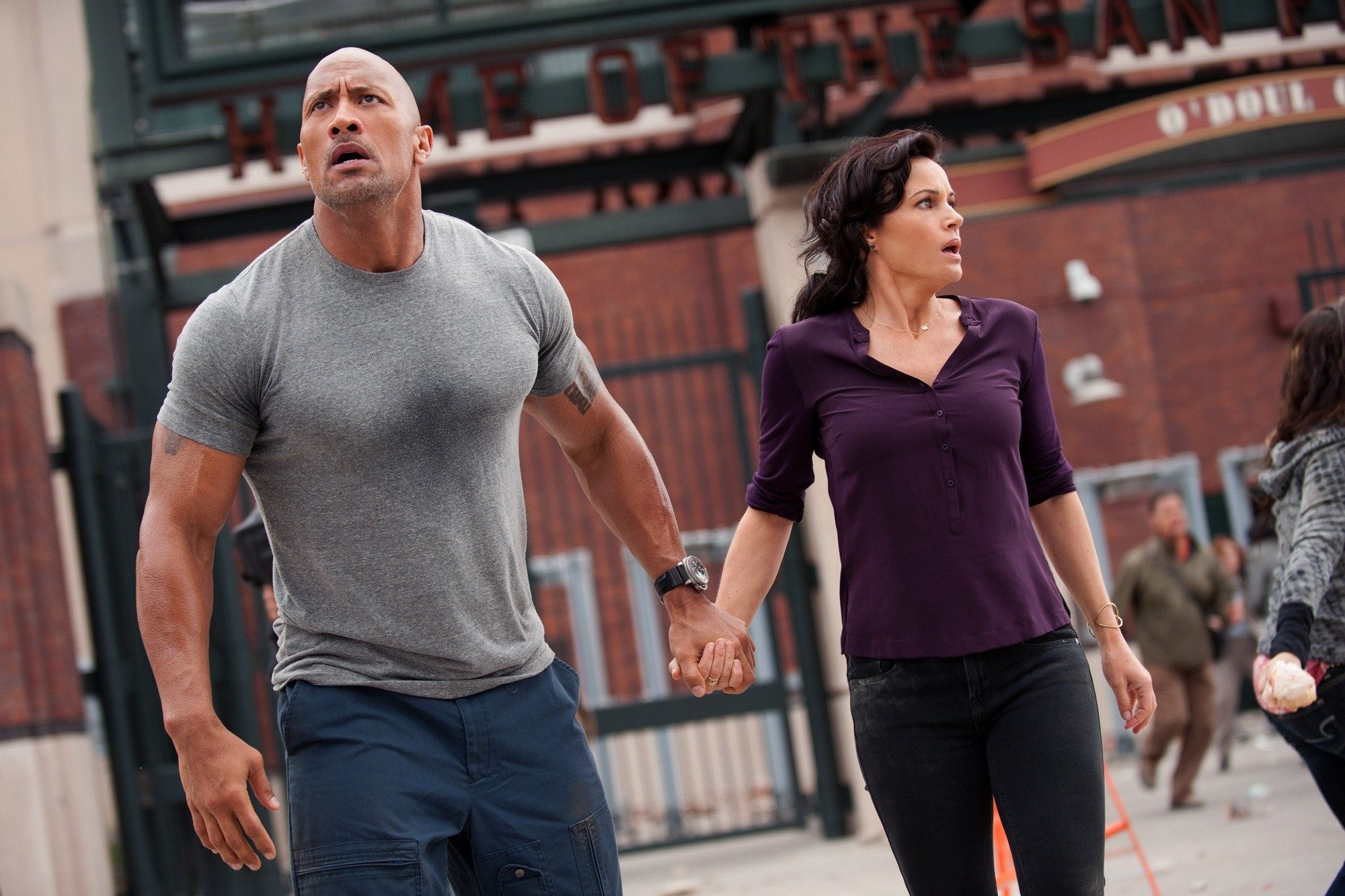 The Rock stars as Ray and Carla Gugino stars as Emma in Warner Bros. Pictures' San Andreas (2015)