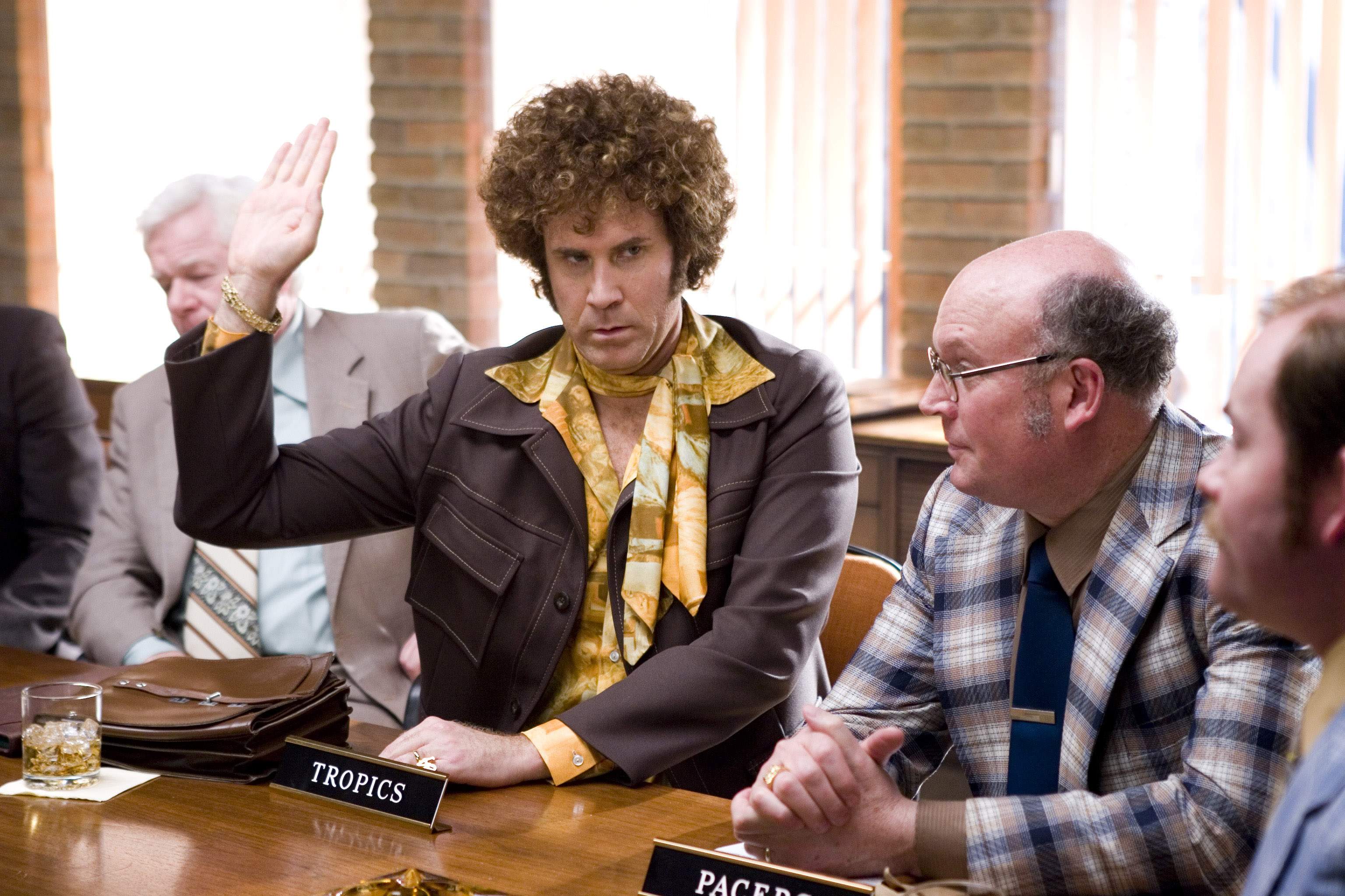 Will Ferrell (center) stars as Jackie Moon, owner of the Flint Tropics, in New Line Cinema's upcoming comedy, SEMI-PRO. Photo Credit: Frank Masi.