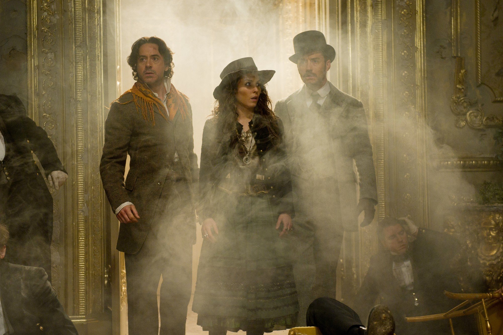 Robert Downey Jr., Noomi Rapace and Jude Law in Warner Bros. Pictures' Sherlock Holmes: A Game of Shadows (2011)