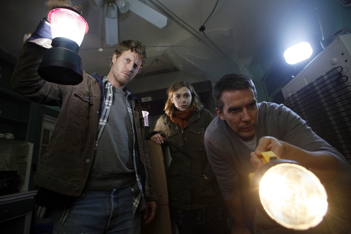 Eric Sheffer Stevens, Elizabeth Olsen and Adam Trese in Open Road Films' Silent House (2012)