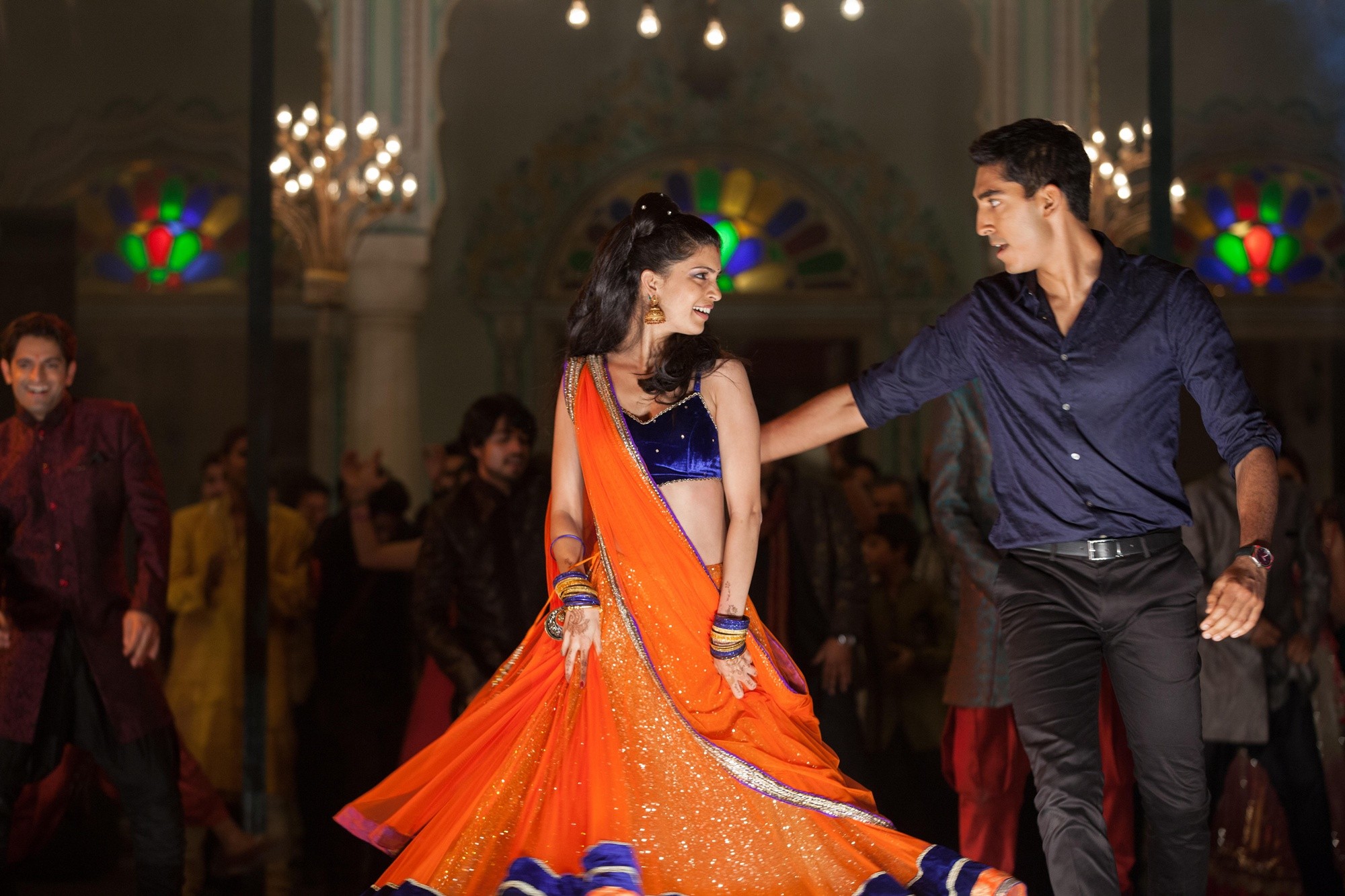 Tena Desae stars as Sunaina and Dev Patel stars as Sonny Kapoor in Fox Searchlight Pictures' The Second Best Exotic Marigold Hotel (2015)