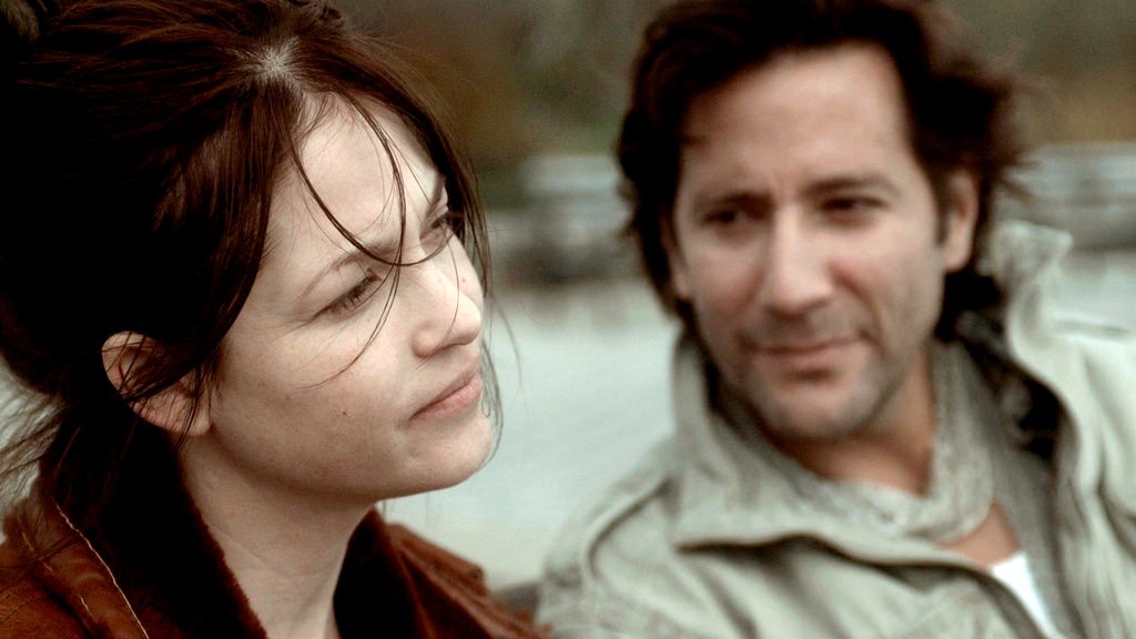 Nicki Aycox stars as Lexi and Henry Ian Cusick stars as Danny Hart in Monterey Media's The Girl on the Train (2014)