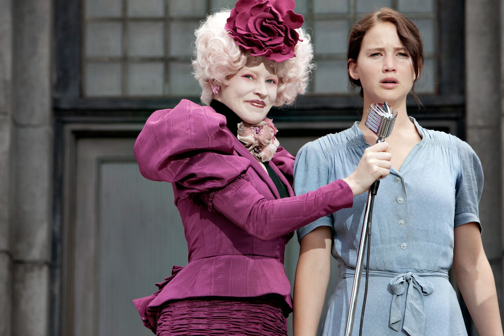 Elizabeth Banks stars as Effie Trinket and Jennifer Lawrence stars as Katniss Everdeen in Lionsgate Films' The Hunger Games (2012). Photo credit by Murray Close.