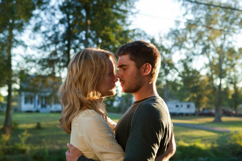 Taylor Schilling stars as Beth Clayton and Zac Efron stars as Logan Thibault in Warner Bros. Pictures' The Lucky One (2012)