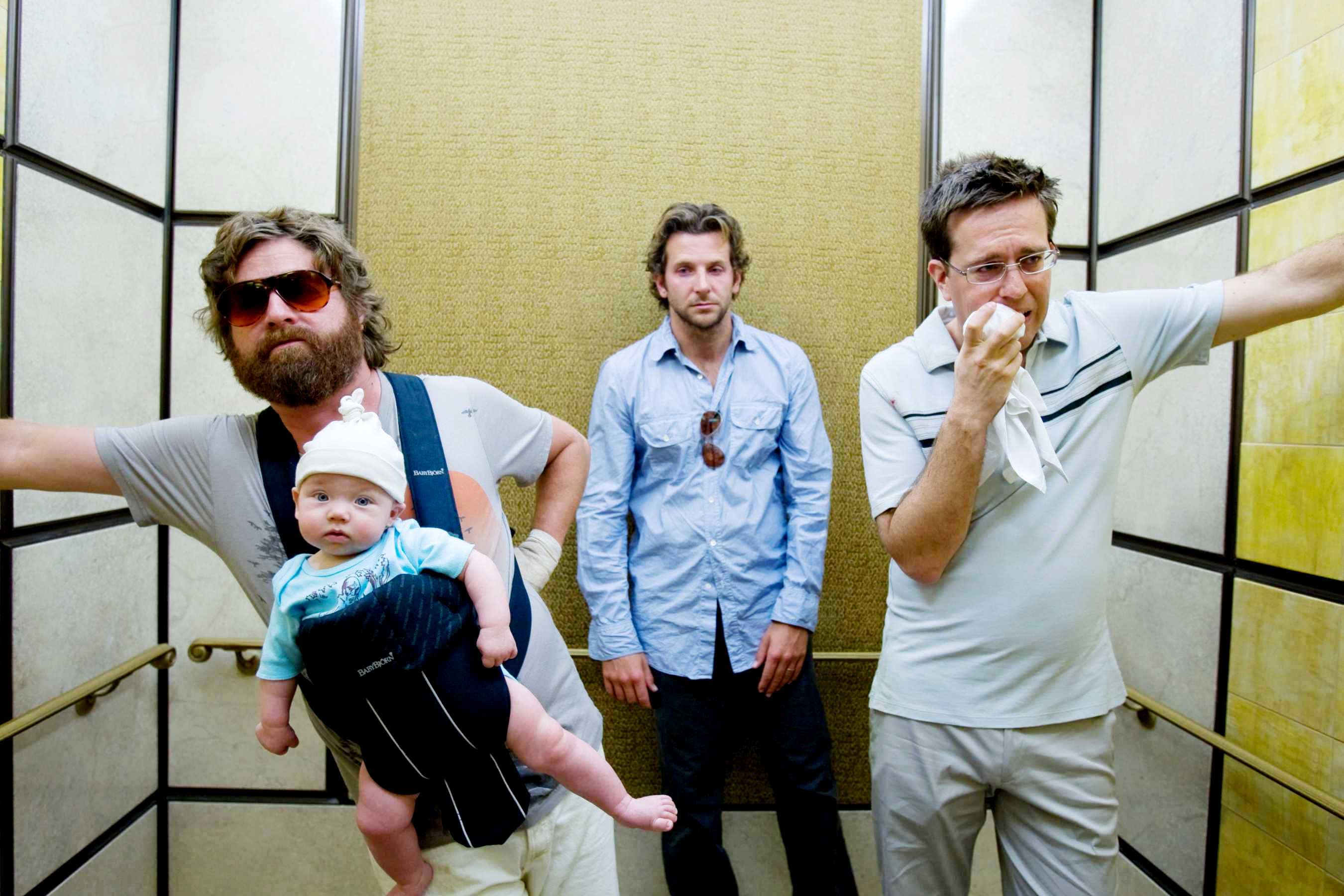 Zach Galifianakis, Bradley Cooper and Ed Helms in Warner Bros. Pictures' The Hangover (2009). Photo credit by Frank Masi.