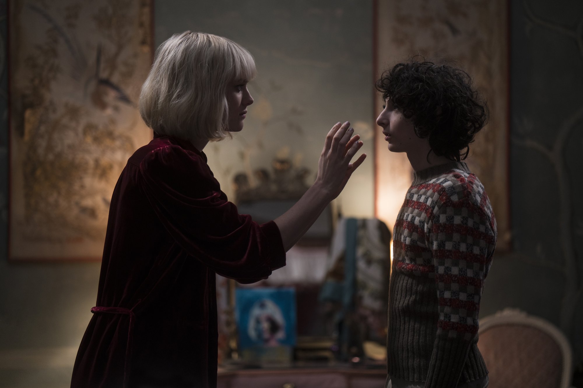 Mackenzie Davis stars as Kate and Finn Wolfhard stars as Miles in Universal Pictures' The Turning (2020)