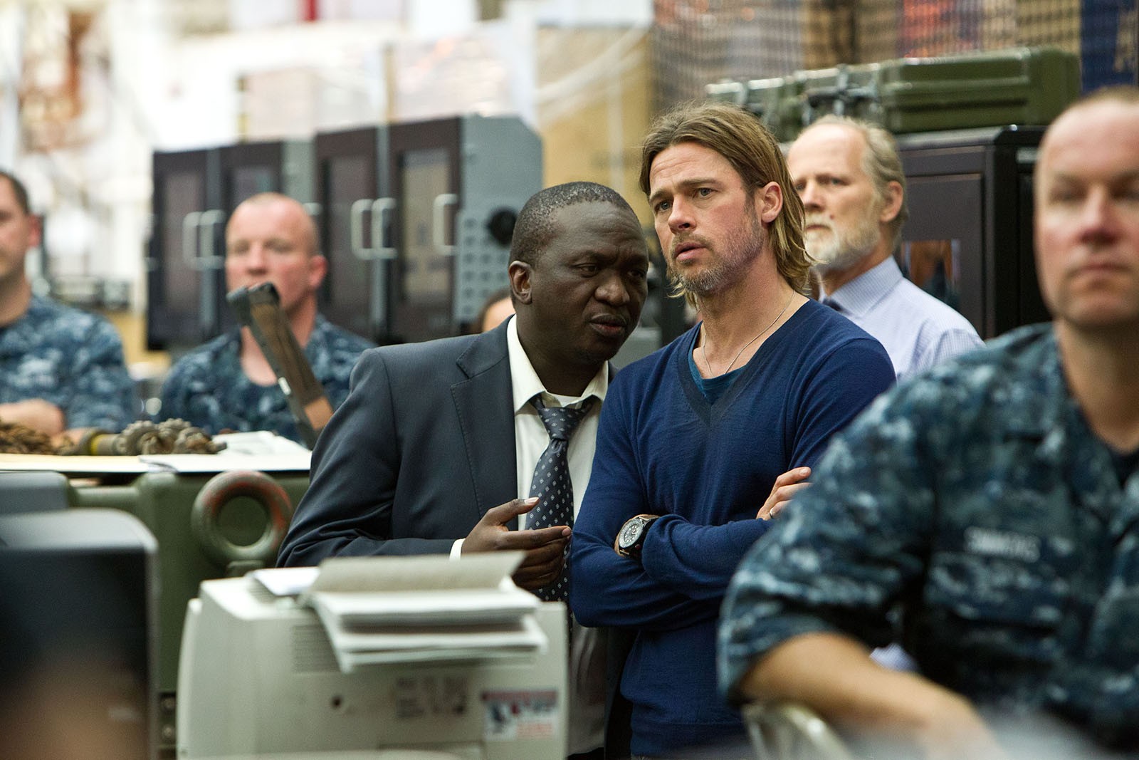 Fana Mokoena stars as Thierry and Brad Pitt stars as Gerry Lane in Paramount Pictures' World War Z (2013)
