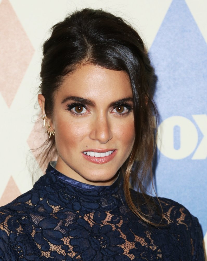 Nikki Reed ear piercings