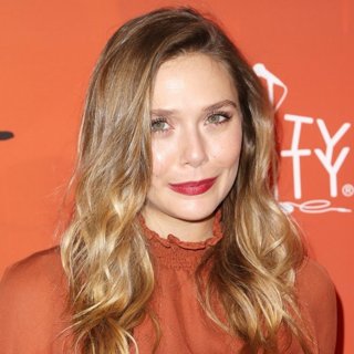 Elizabeth Olsen Suffers Wardrobe Malfunction in Paris, Flashes Skin ...